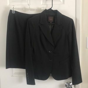 Two-piece women’s suit with skirt